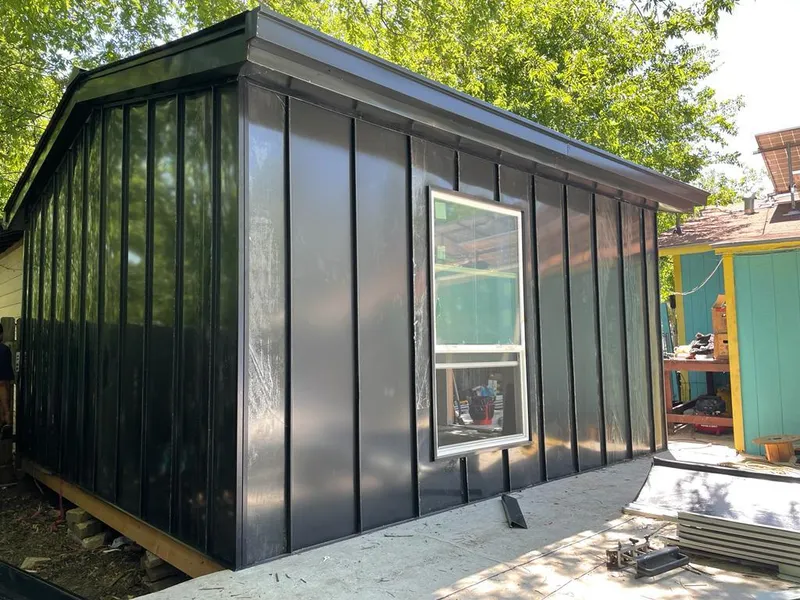 Black standing seam metal wall panels for Roof Inspection in Providence